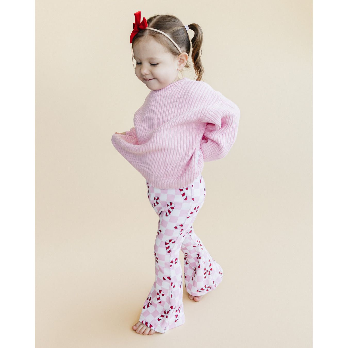 Checkered Candy Cane Flare Pants | Pink