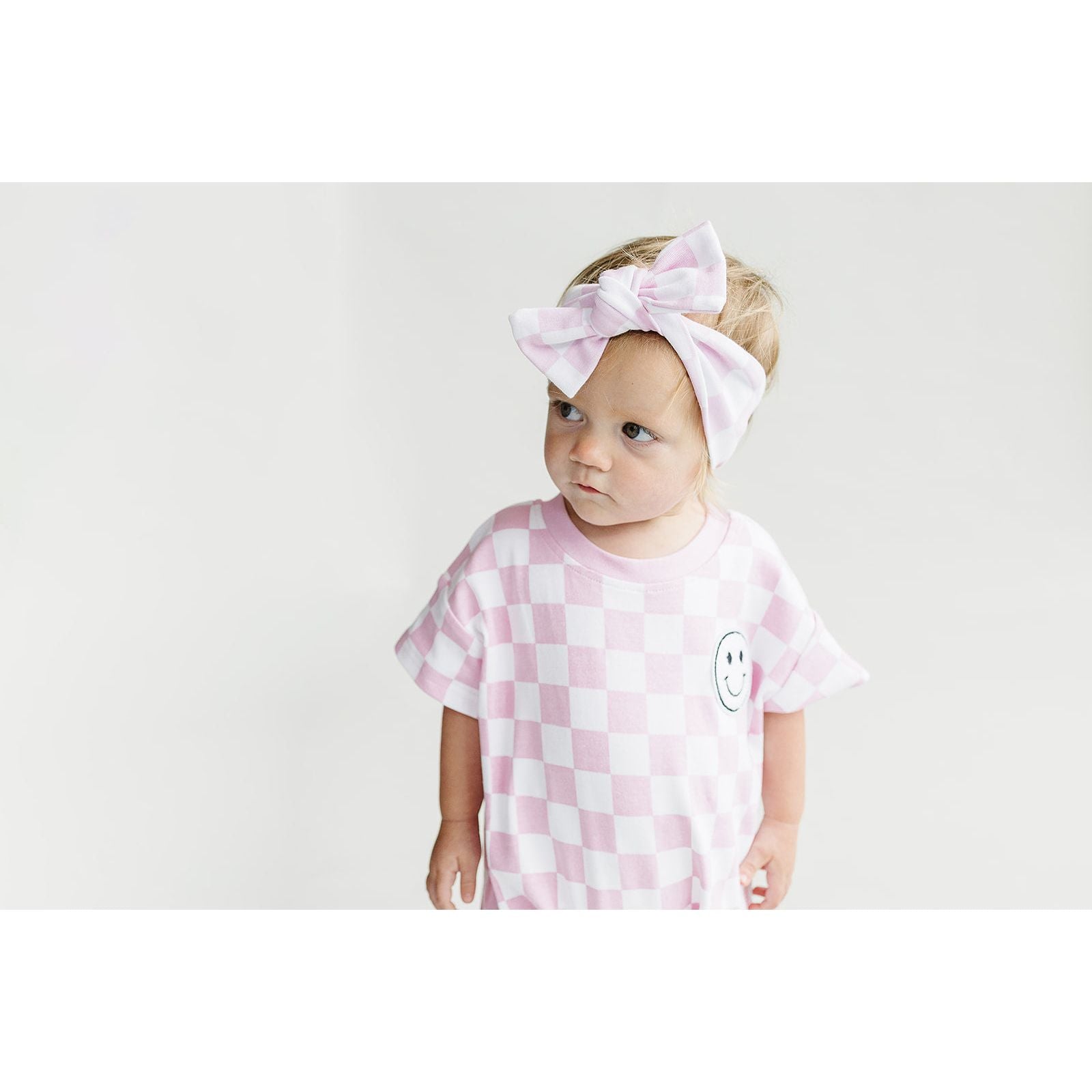 Short Sleeve Bubble Romper | Checkered Smiley Pink