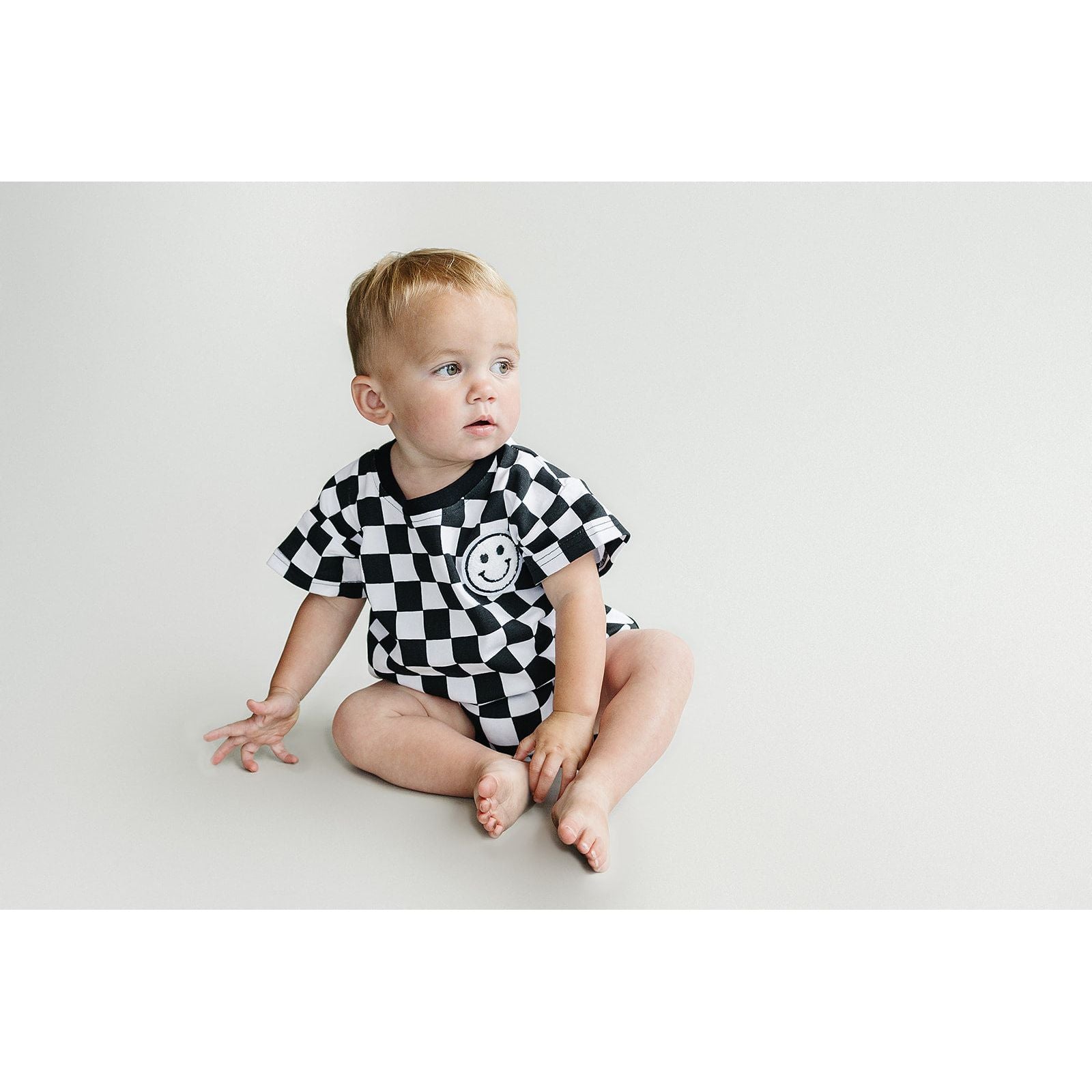 Short Sleeve Bubble Romper | Checkered Smiley Black