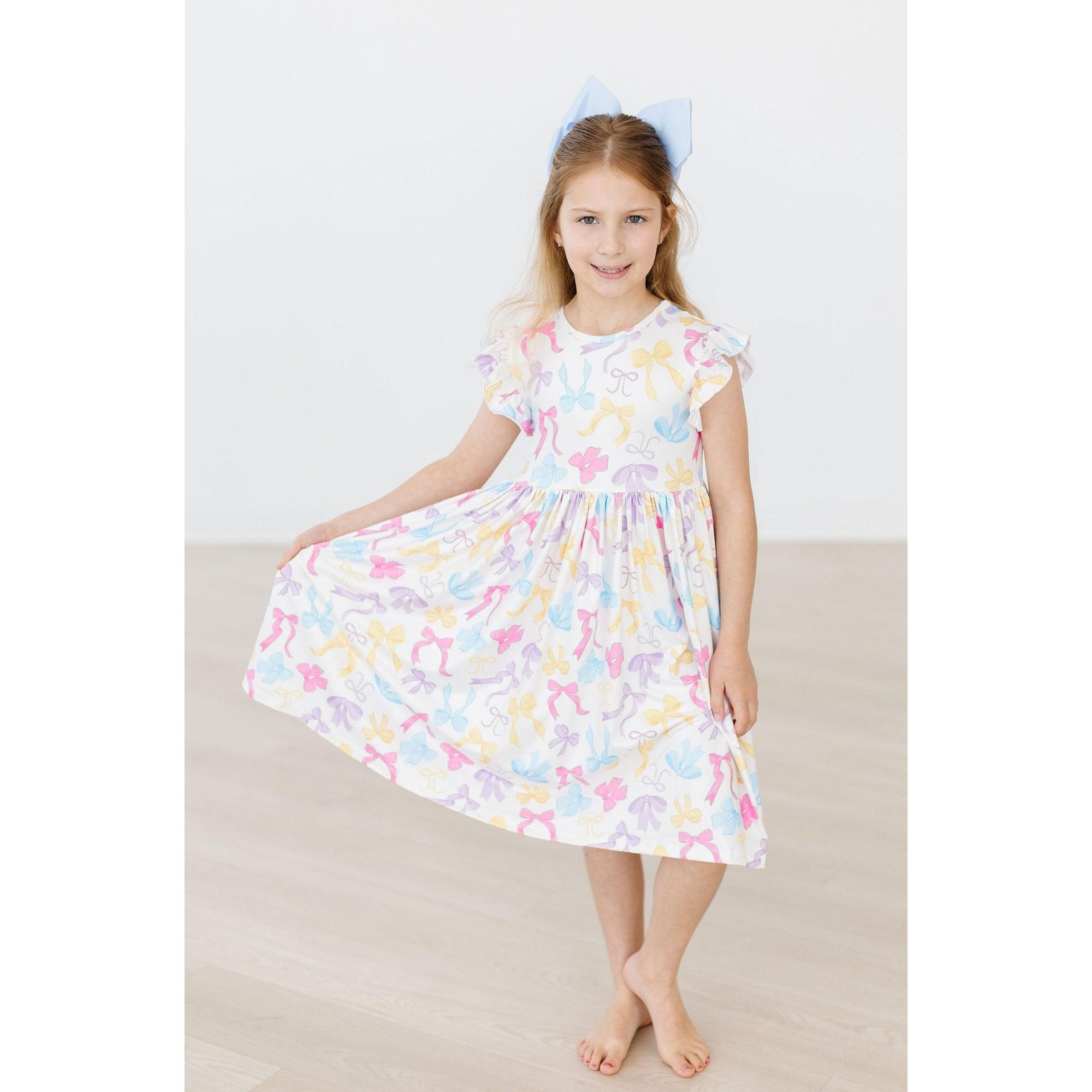 Bow-tastic Flutter Sleeve Twirl Dress