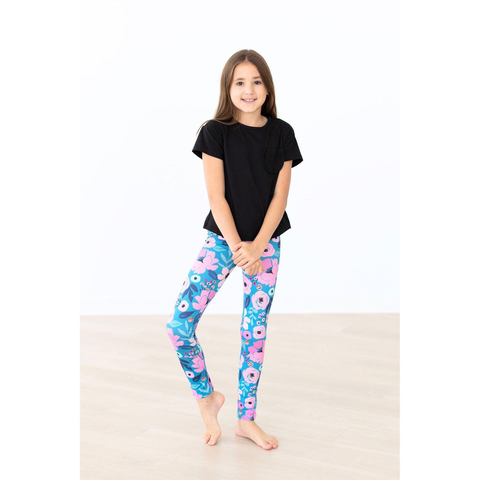 Twirling in Teal Leggings