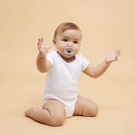 classic pacifier in dove