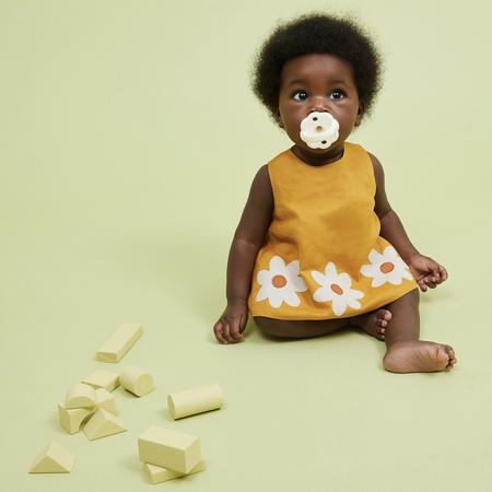 scallop pacifier in gardenia