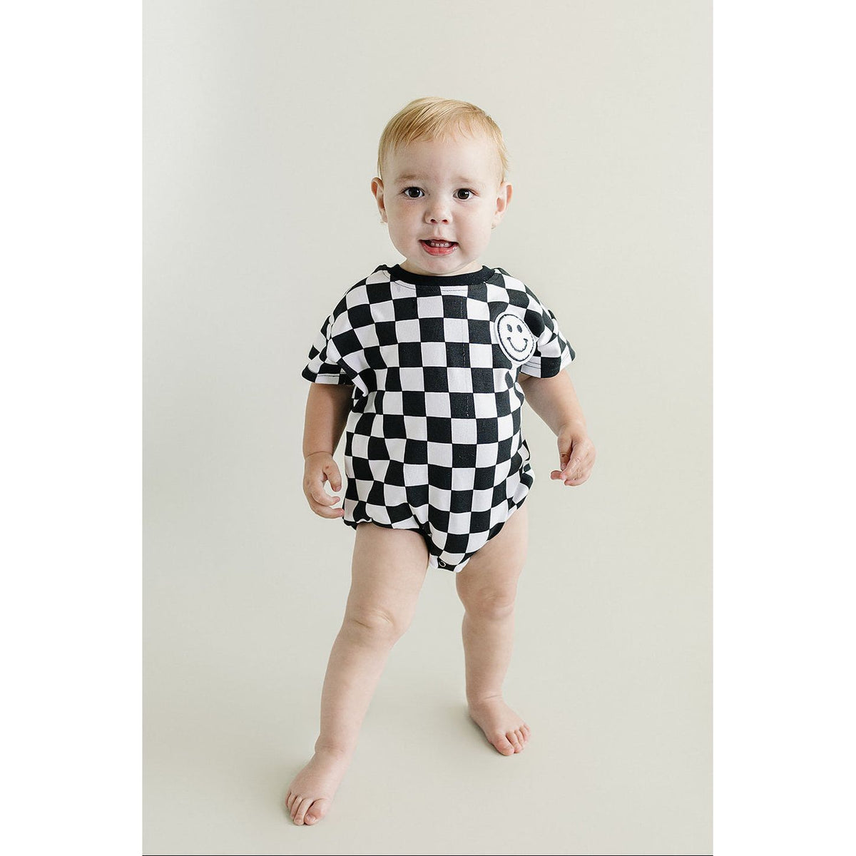 Short Sleeve Bubble Romper | Checkered Smiley Black
