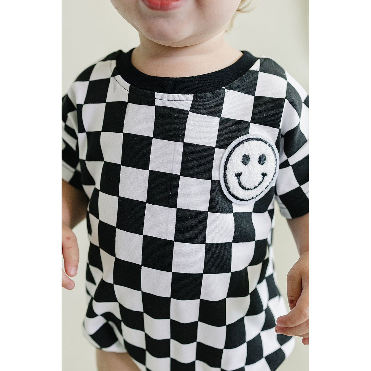 Short Sleeve Bubble Romper | Checkered Smiley Black