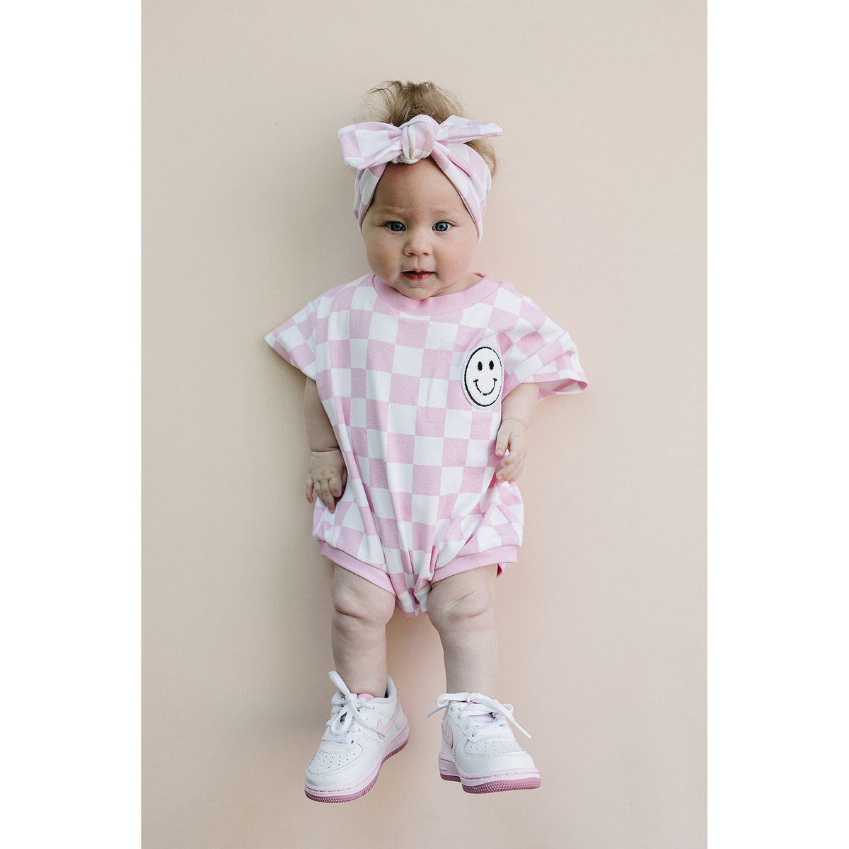Short Sleeve Bubble Romper | Checkered Smiley Pink