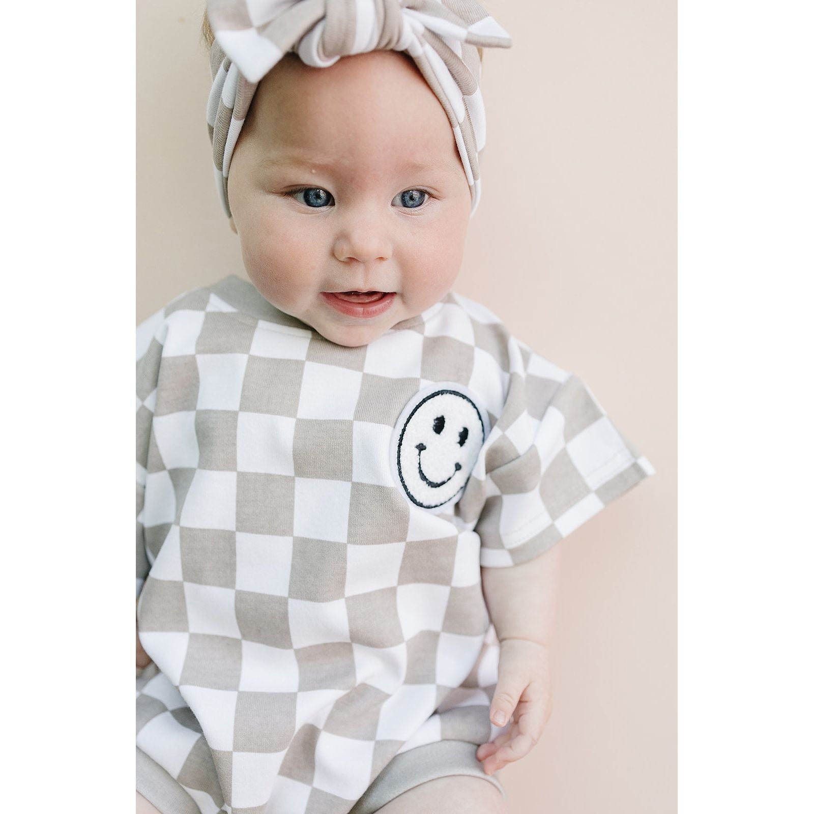 Short Sleeve Bubble Romper | Checkered Smiley Latte