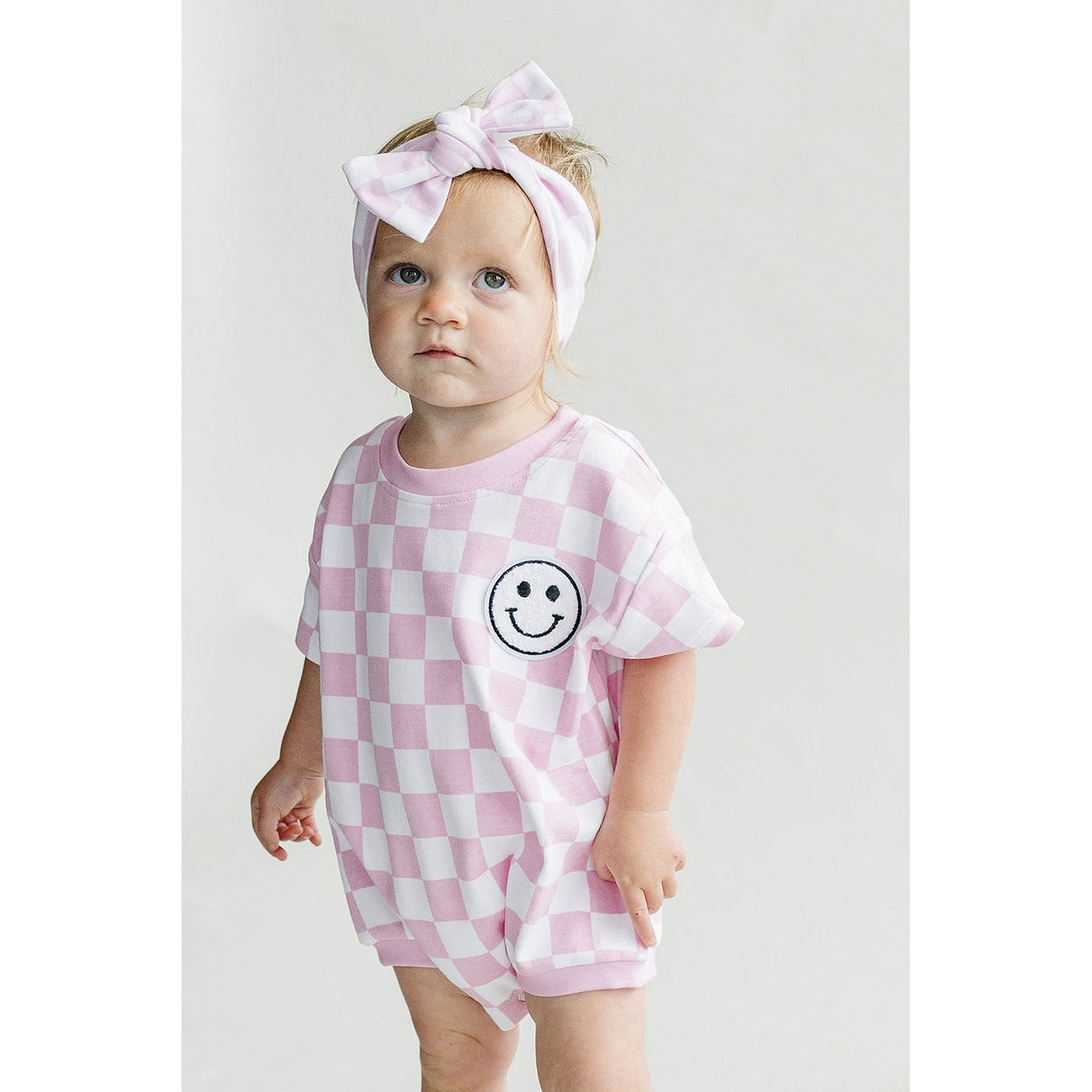 Short Sleeve Bubble Romper | Checkered Smiley Pink