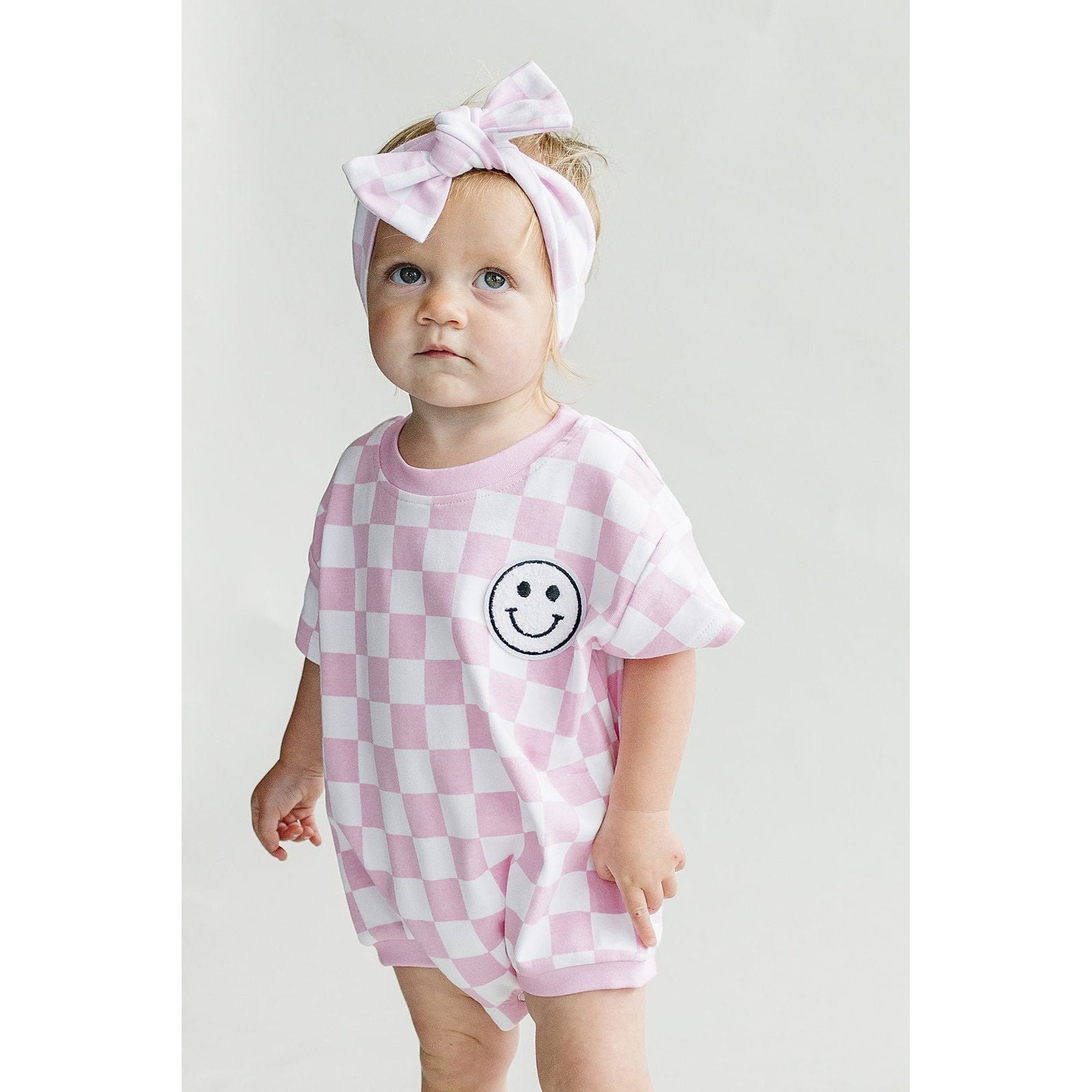 Short Sleeve Bubble Romper | Checkered Smiley Pink