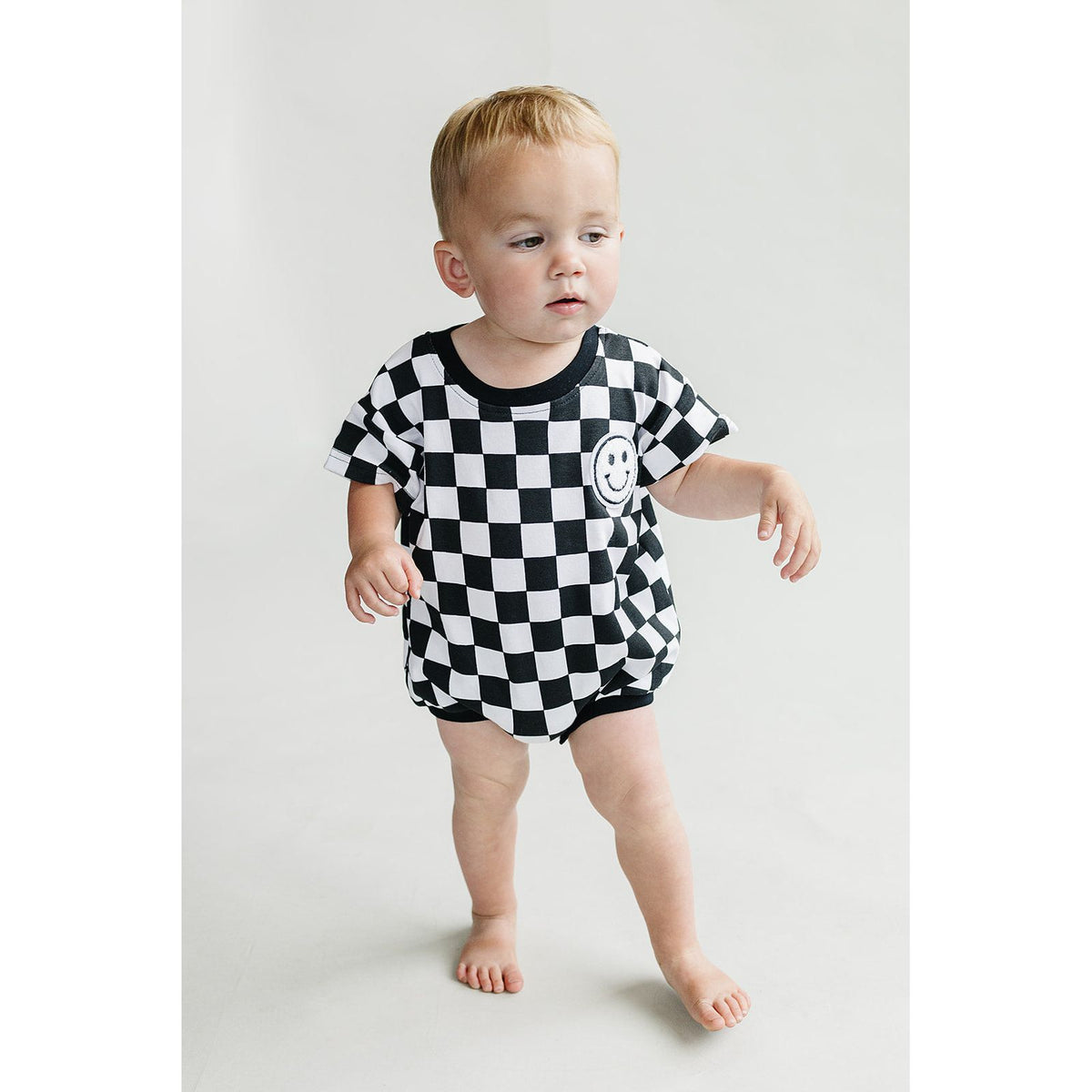 Short Sleeve Bubble Romper | Checkered Smiley Black