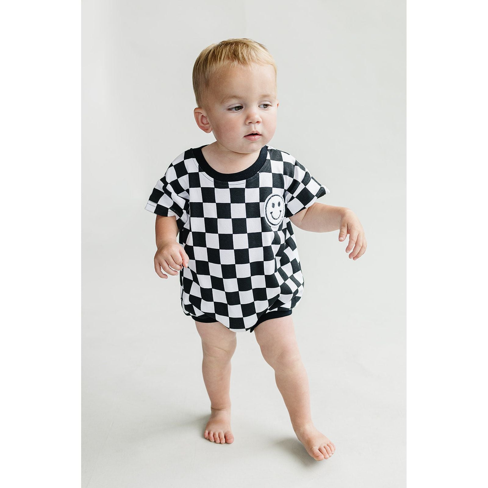 Short Sleeve Bubble Romper | Checkered Smiley Black