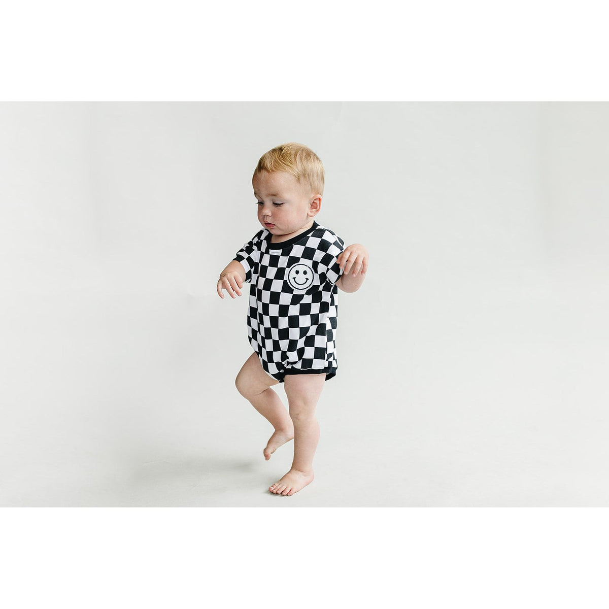 Short Sleeve Bubble Romper | Checkered Smiley Black