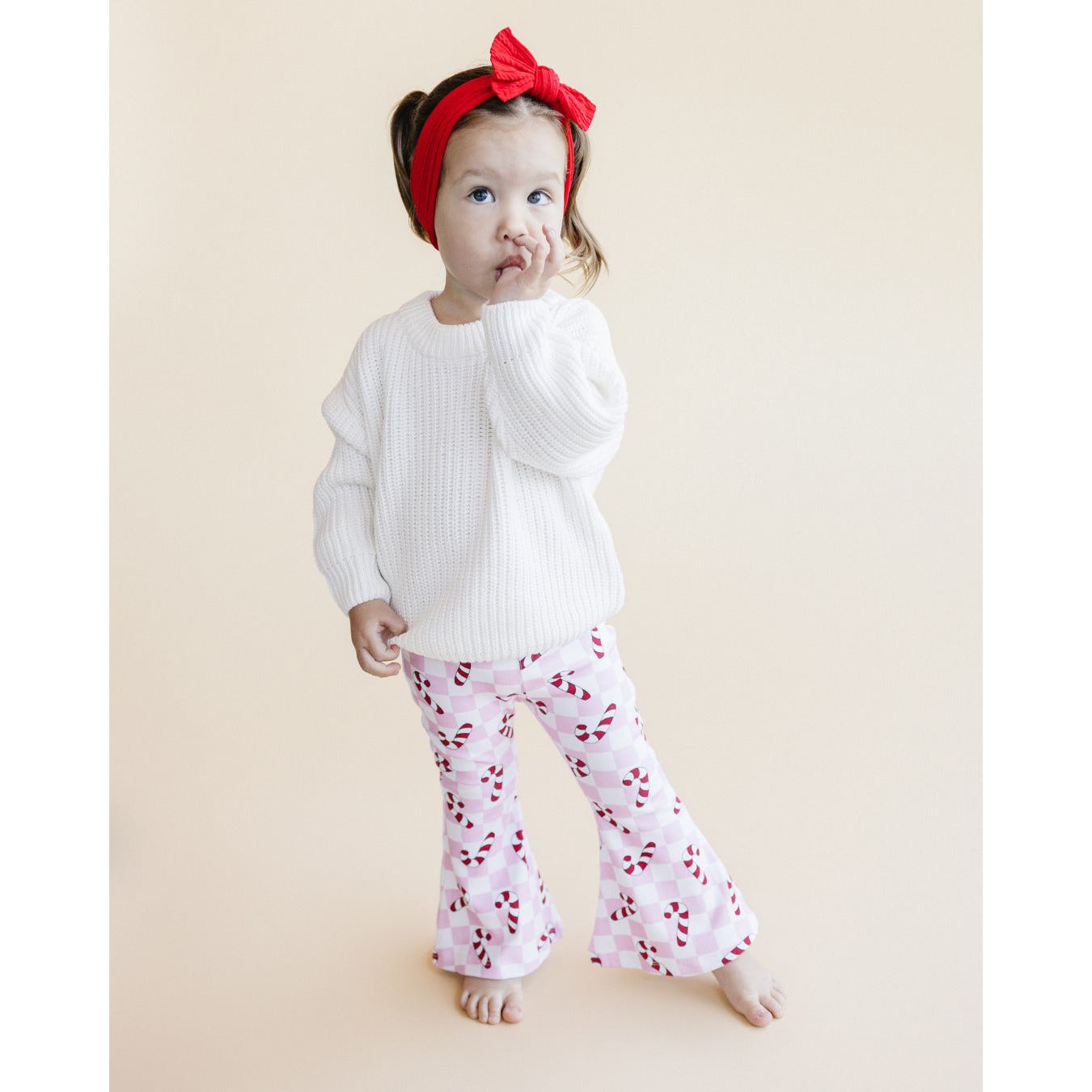 Checkered Candy Cane Flare Pants | Pink