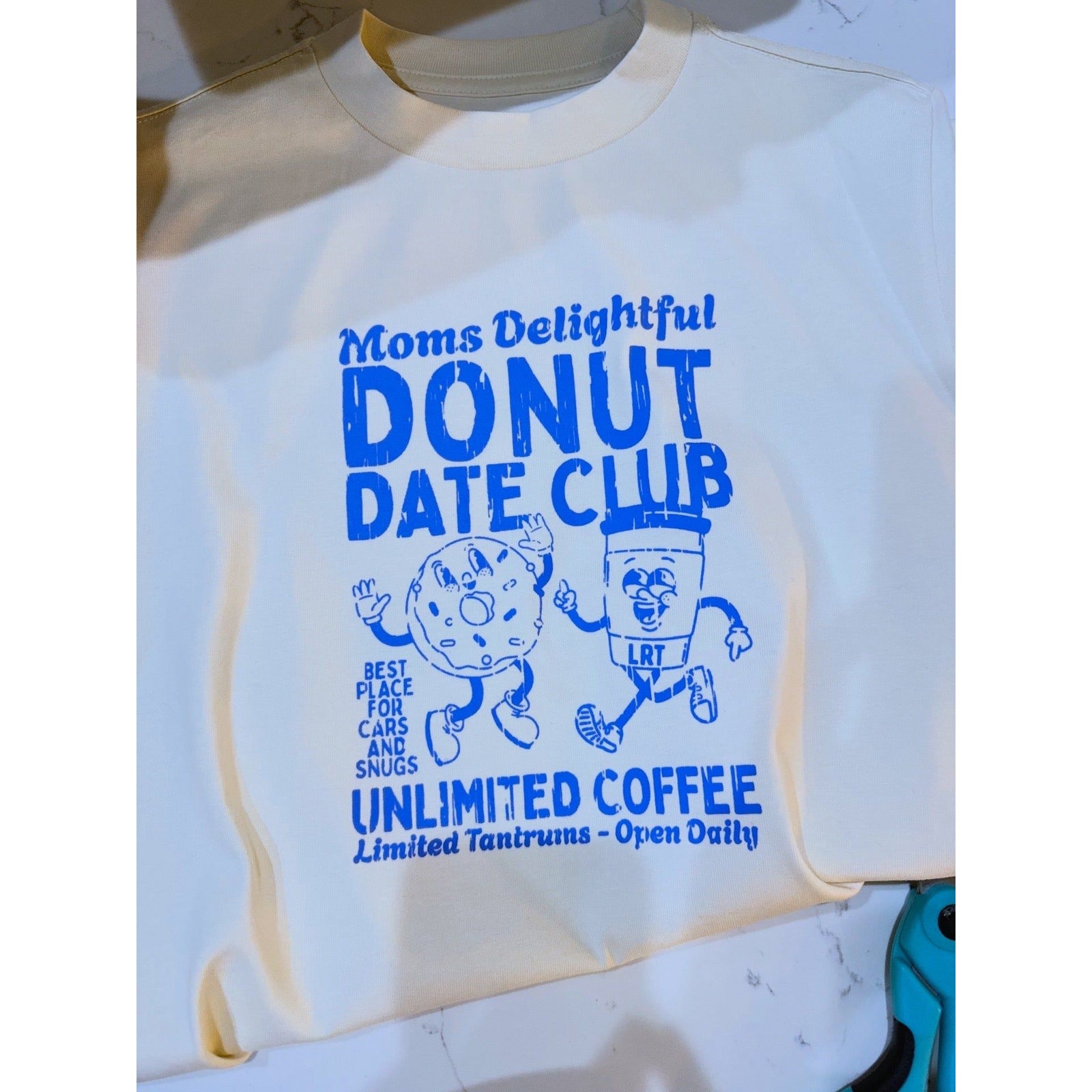 MOMS DONUT DATE CLUB TEE - CREAM (FRONT ONLY)