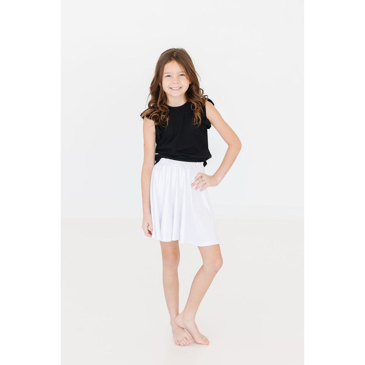 Black S/S Ruffle Tee