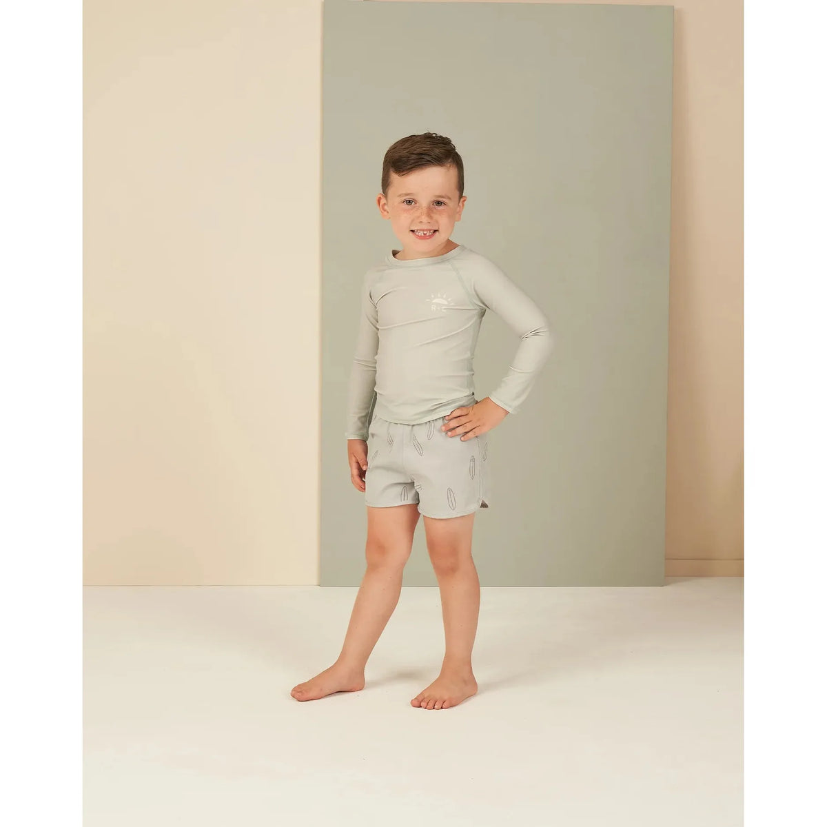 swim trunk || surfboard