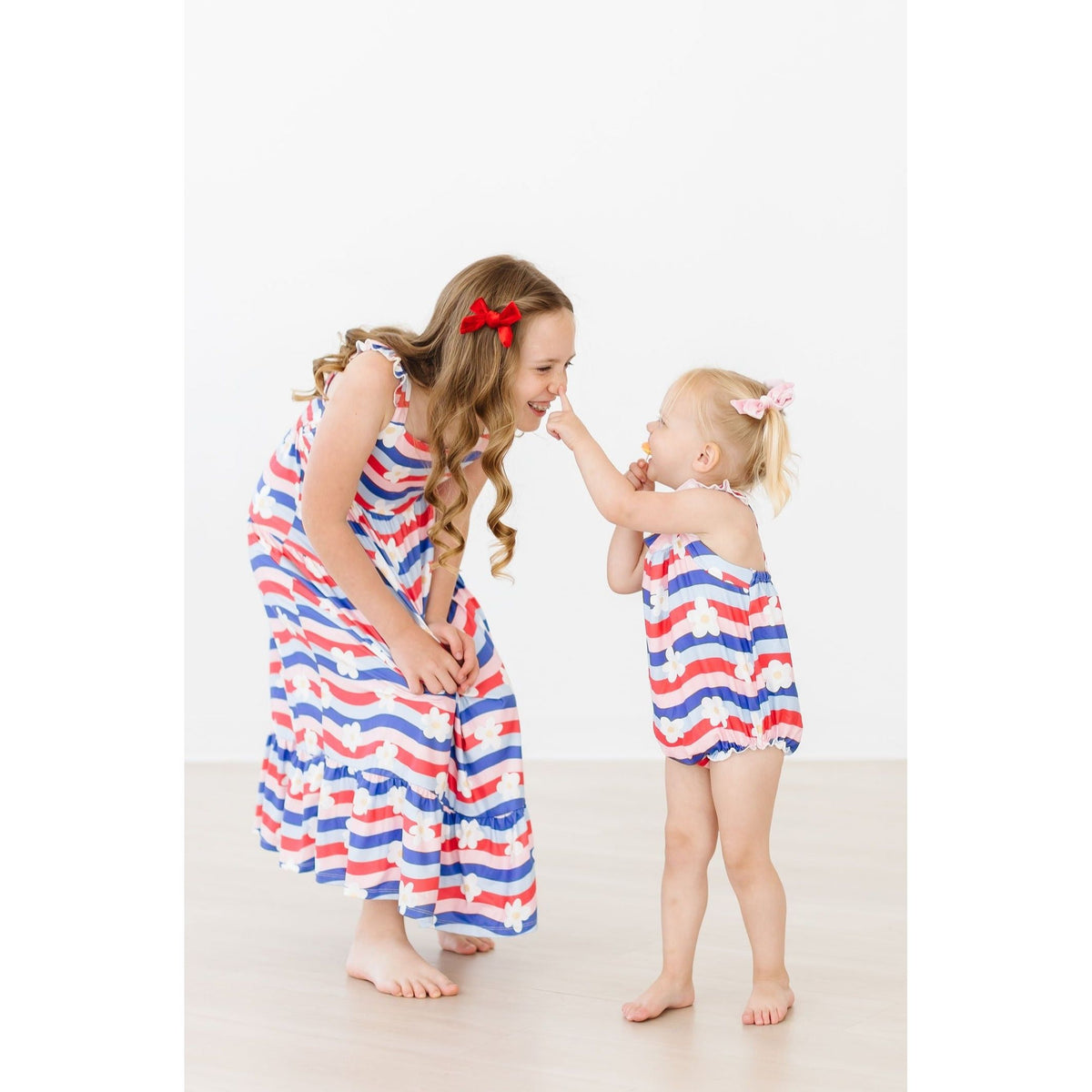 July Vibes Ruffle Cross Back Romper