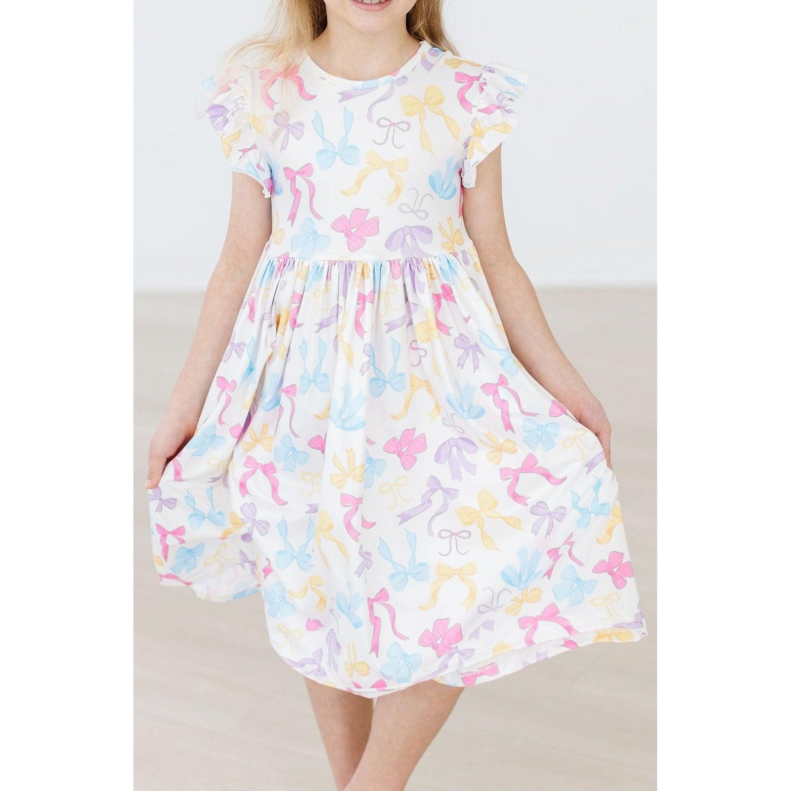 Bow-tastic Flutter Sleeve Twirl Dress