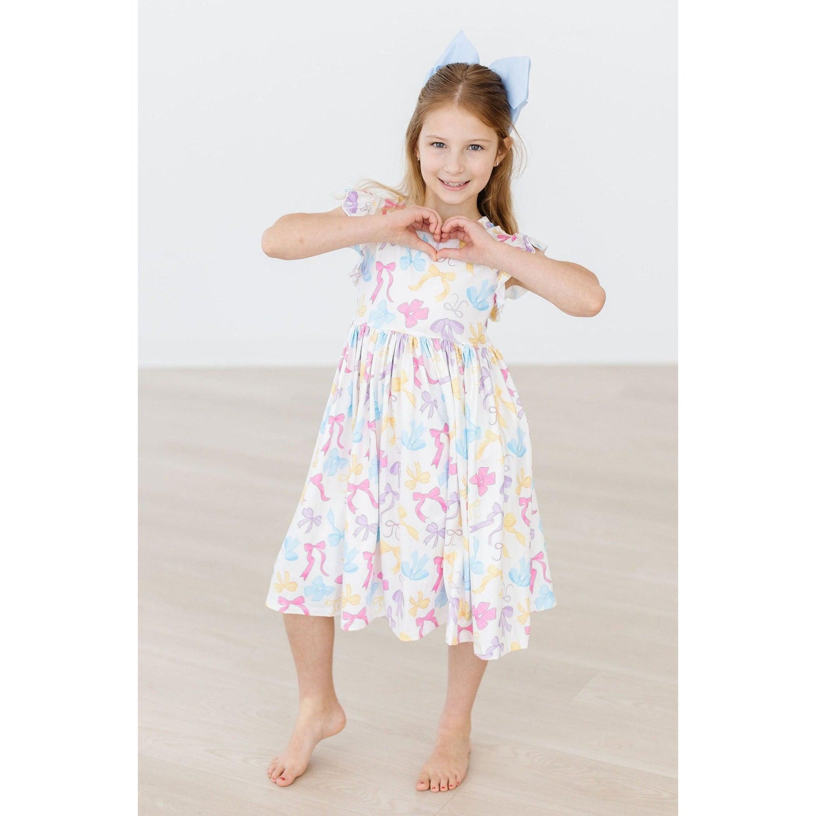 Bow-tastic Flutter Sleeve Twirl Dress