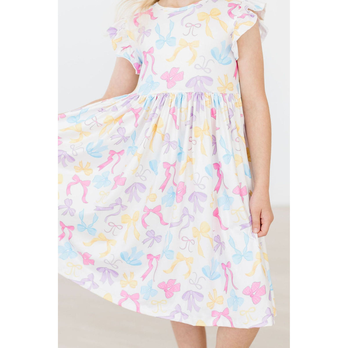 Bow-tastic Flutter Sleeve Twirl Dress