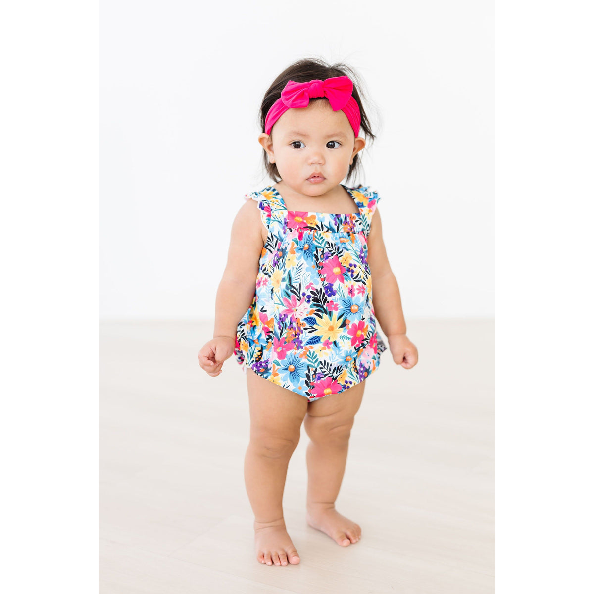 Petal Paradise Ruffle Cross Back Romper