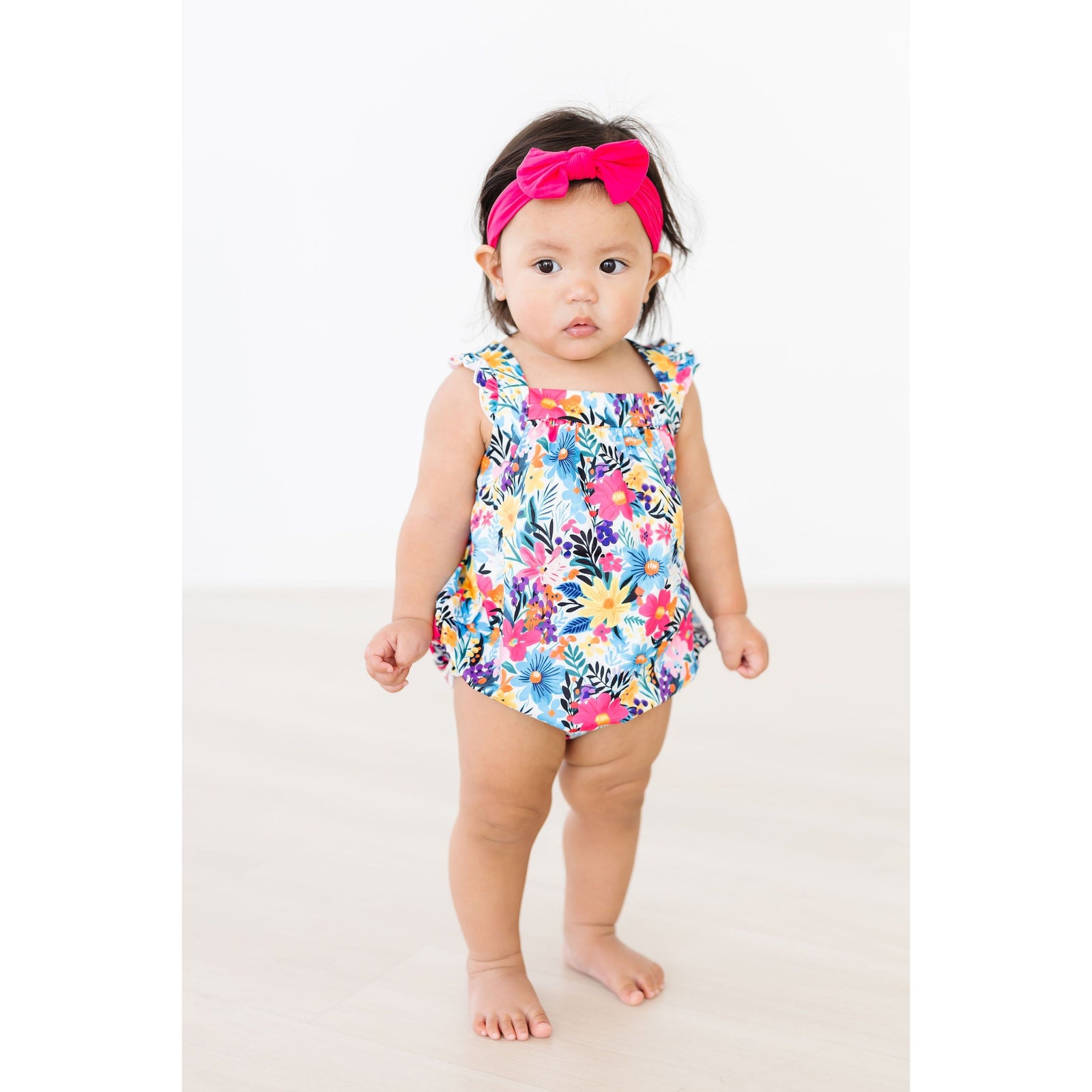 Petal Paradise Ruffle Cross Back Romper