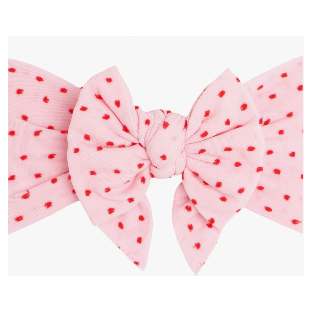 pink with red dot bow