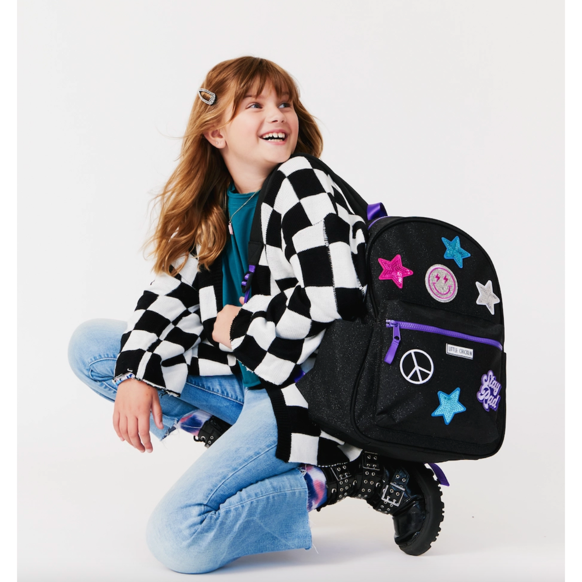 black glitter backpack with patches