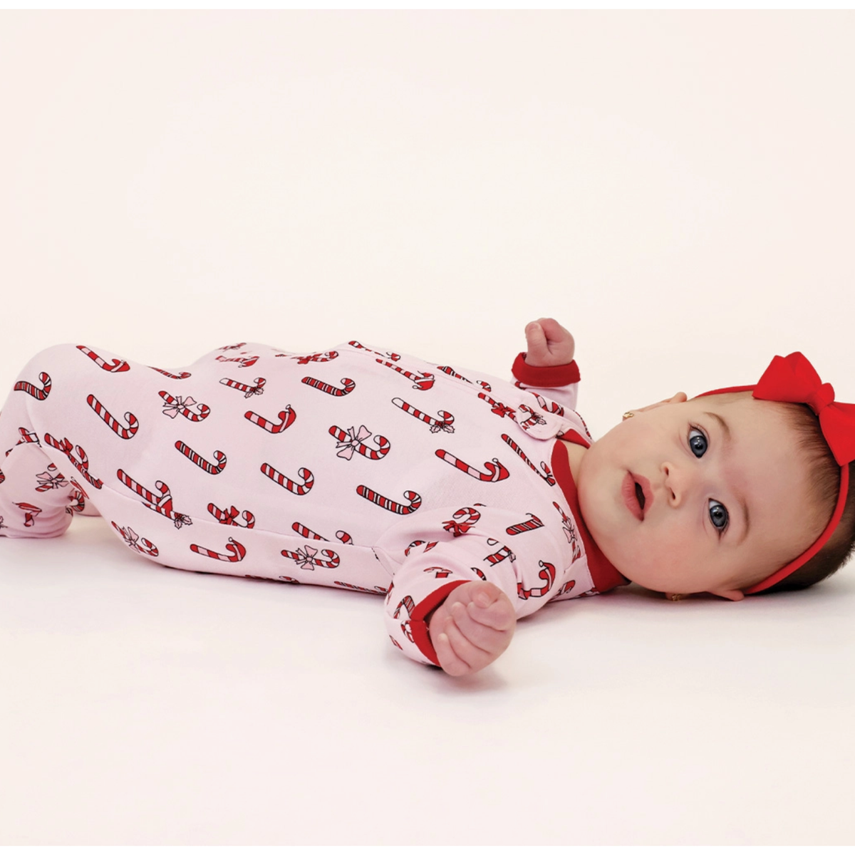 zipper footie | pink candy cane