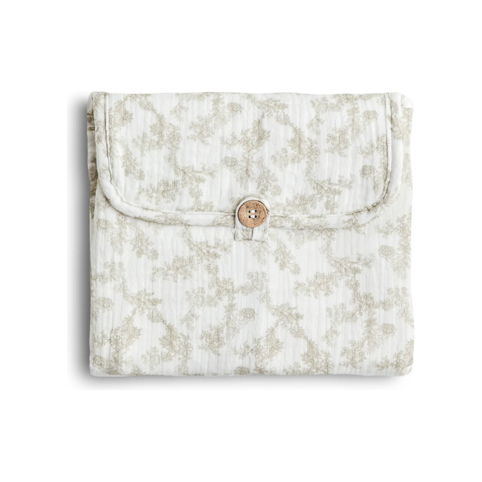 soft & secure baby changing pad | floral nude