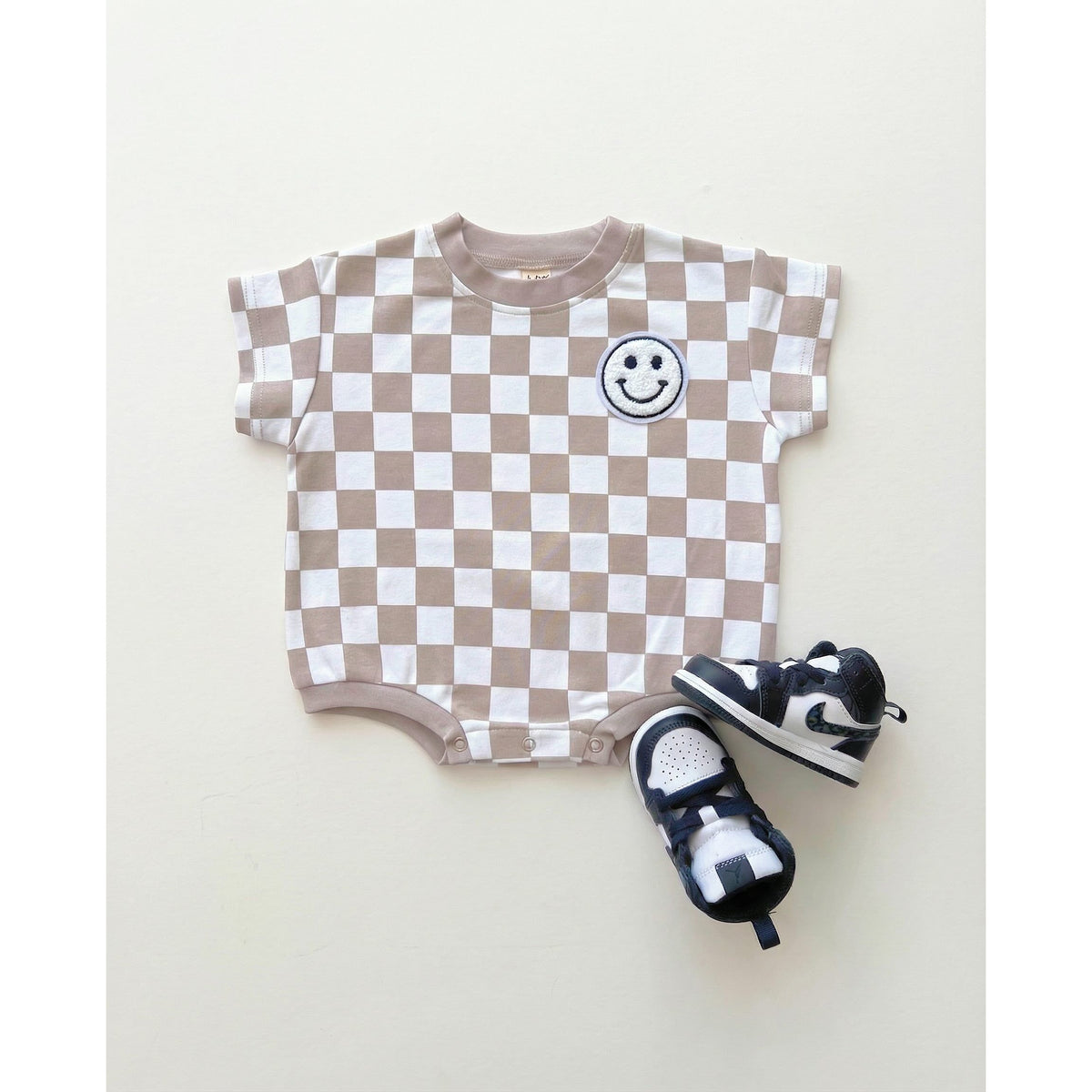 Short Sleeve Bubble Romper | Checkered Smiley Latte