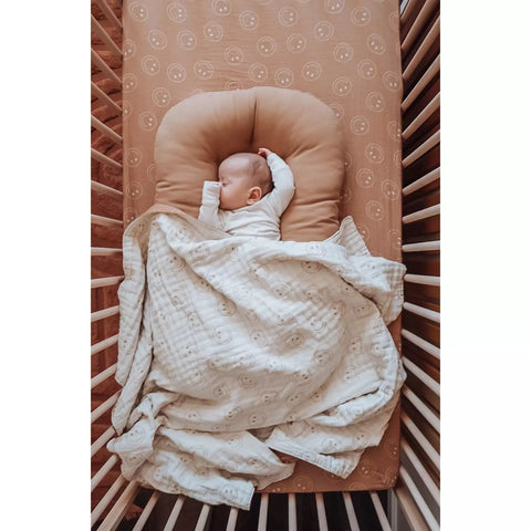 reversible tan/ivory smile muslin quilt