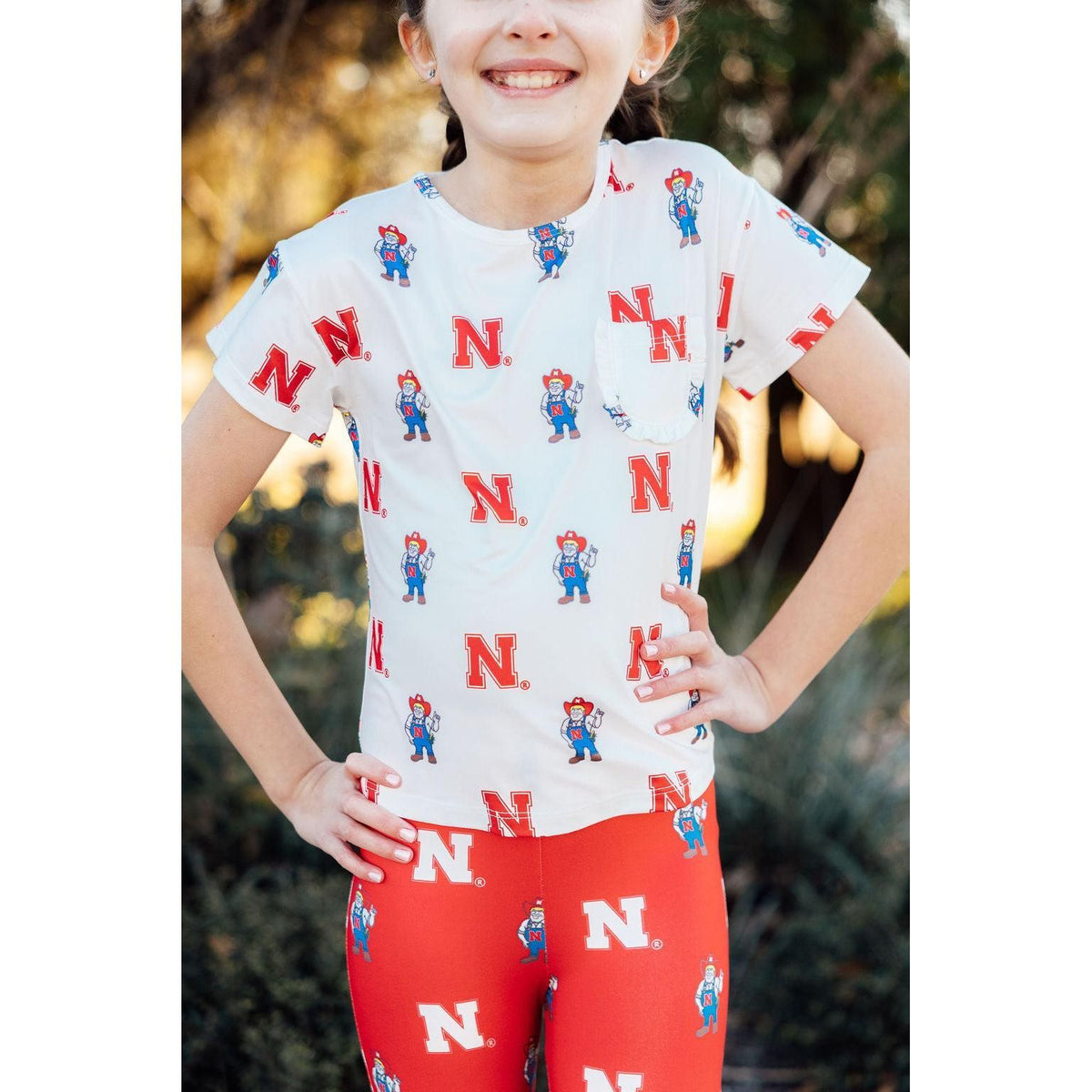 Nebraska White Herbie Husker Ruffle Pocket Tee