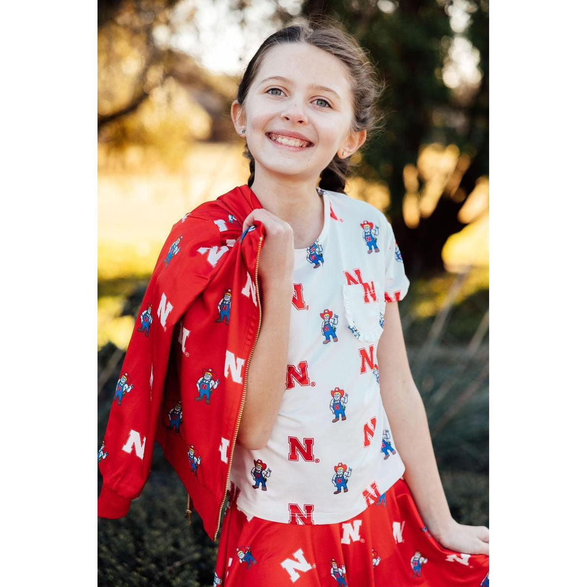 Nebraska White Herbie Husker Ruffle Pocket Tee