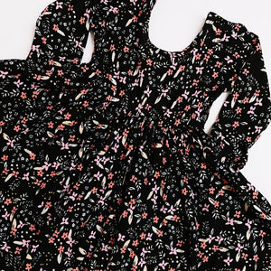 classic long sleeve twirl dress in black floral