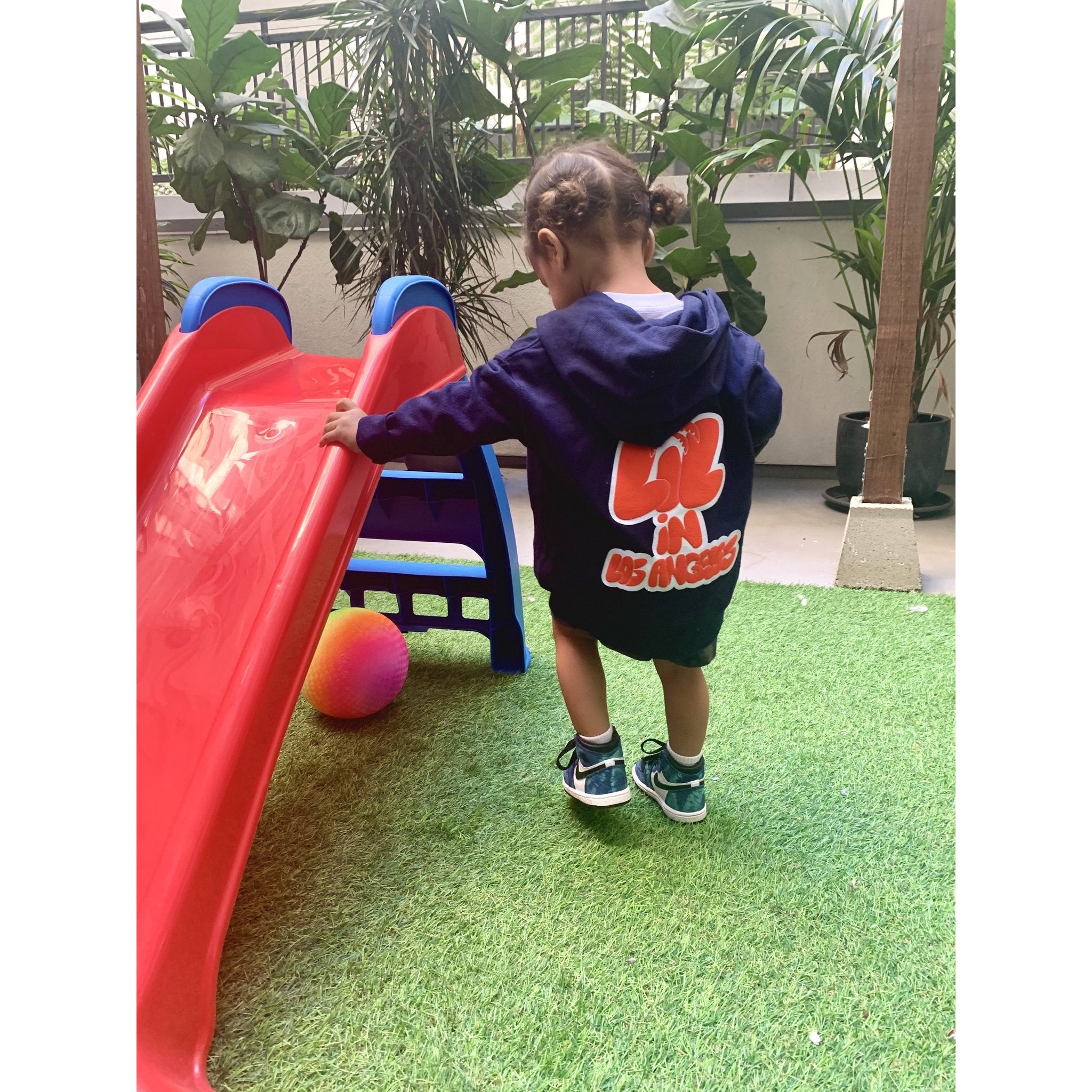 lil in LA navy hoodie