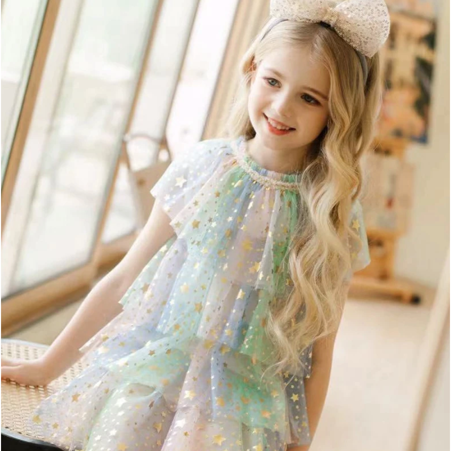 star tulle dress in pastel rainbow