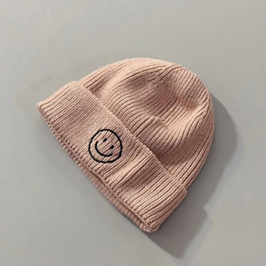 smiley beanie in pink