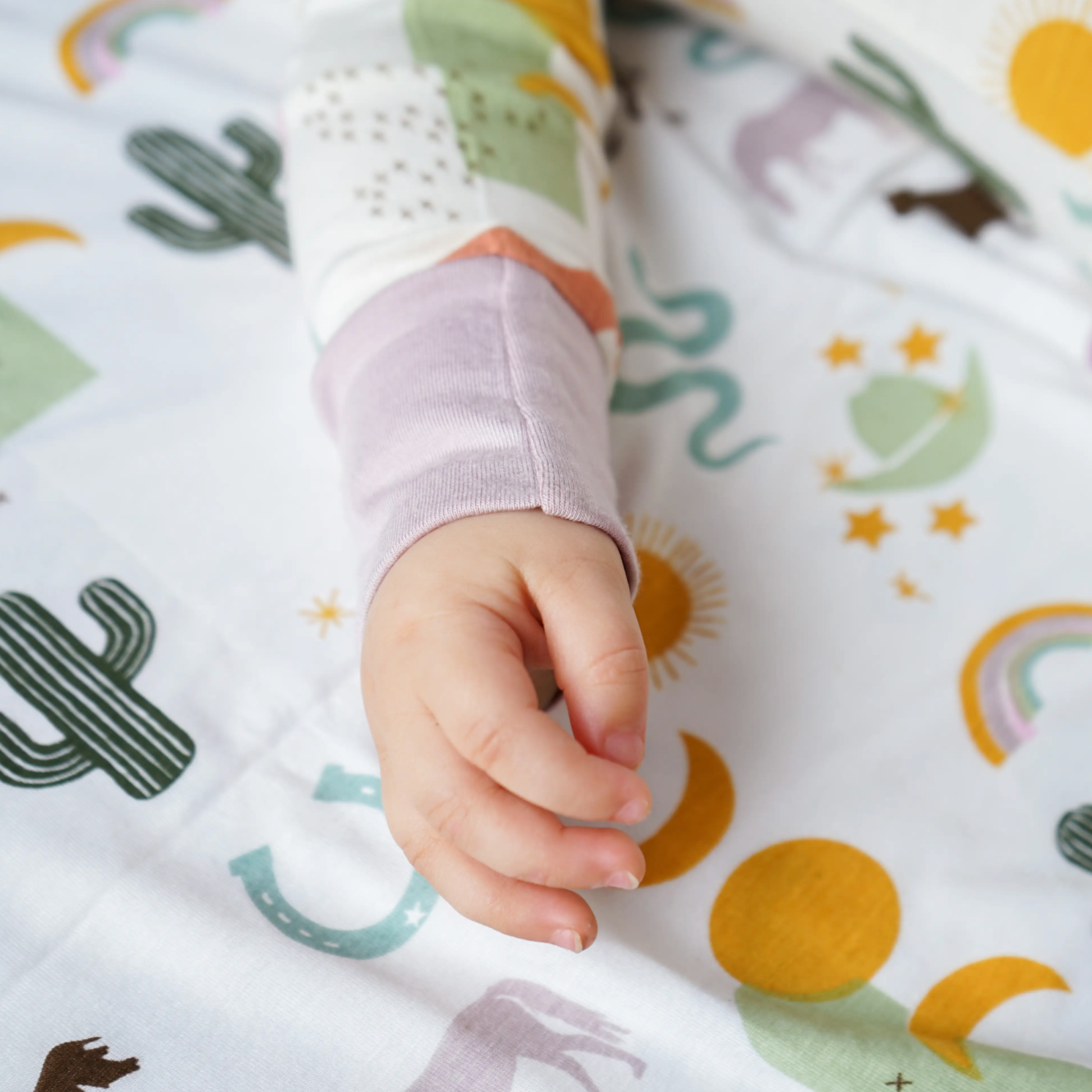 bamboo baby convertible footie pajamas in wild & free
