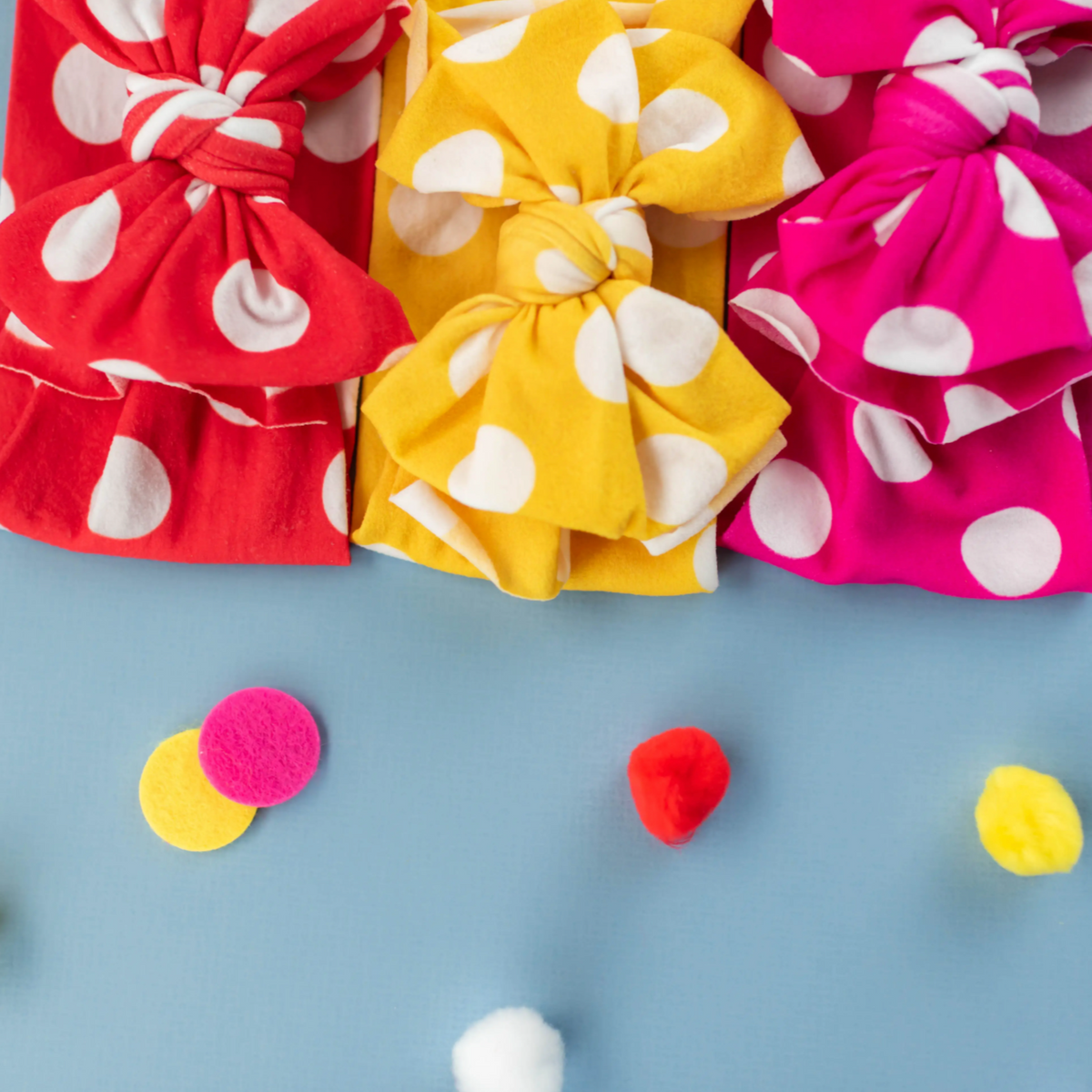 red polka dot printed bow