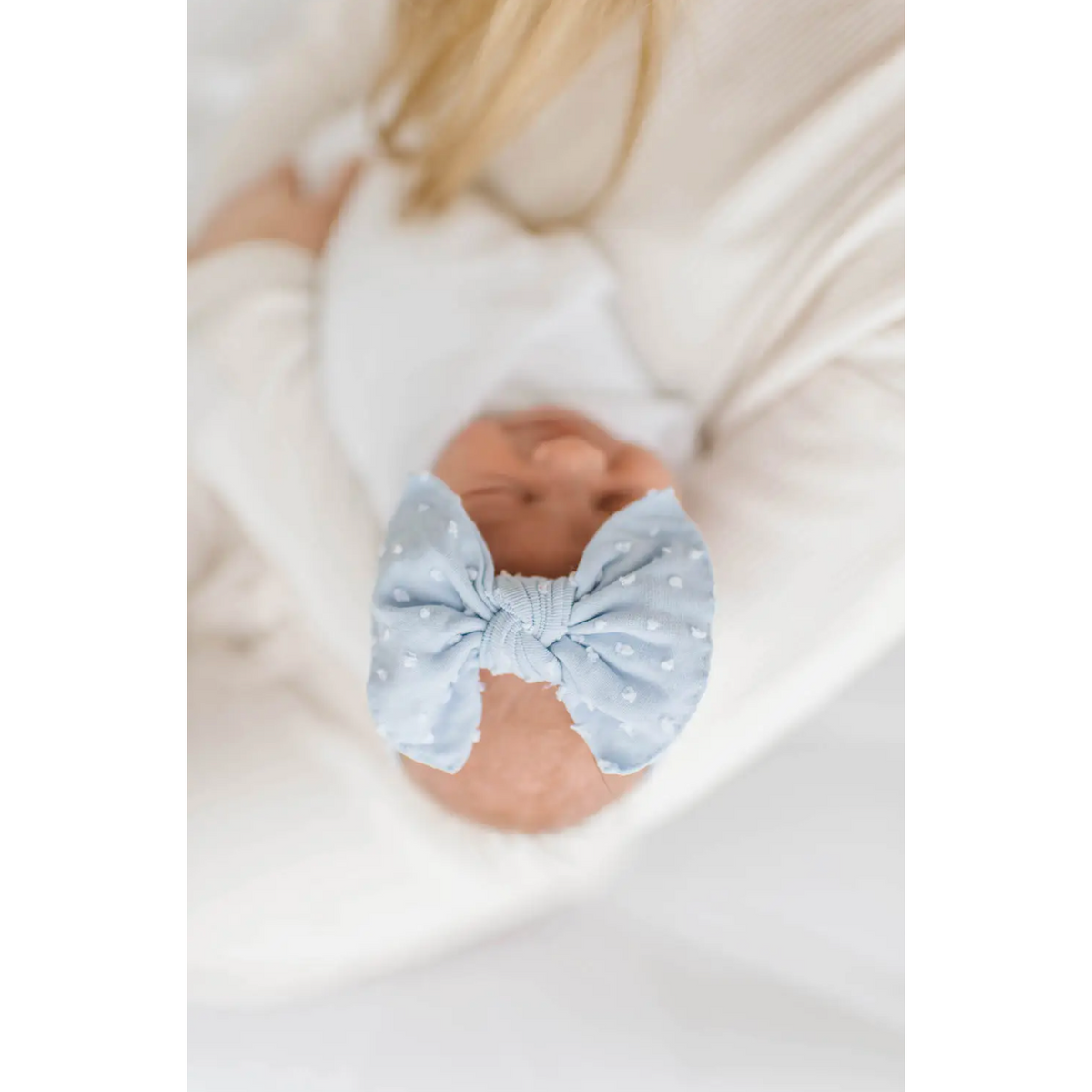 dusty blue dot knot bow