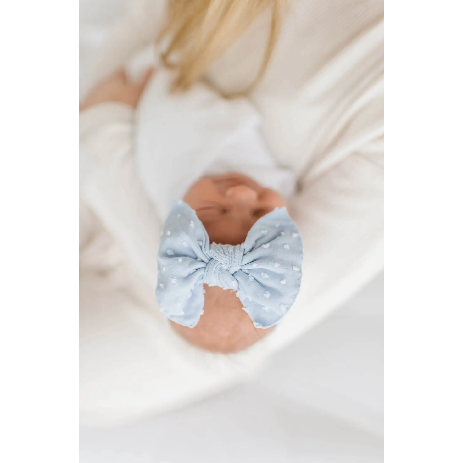 dusty blue dot knot bow