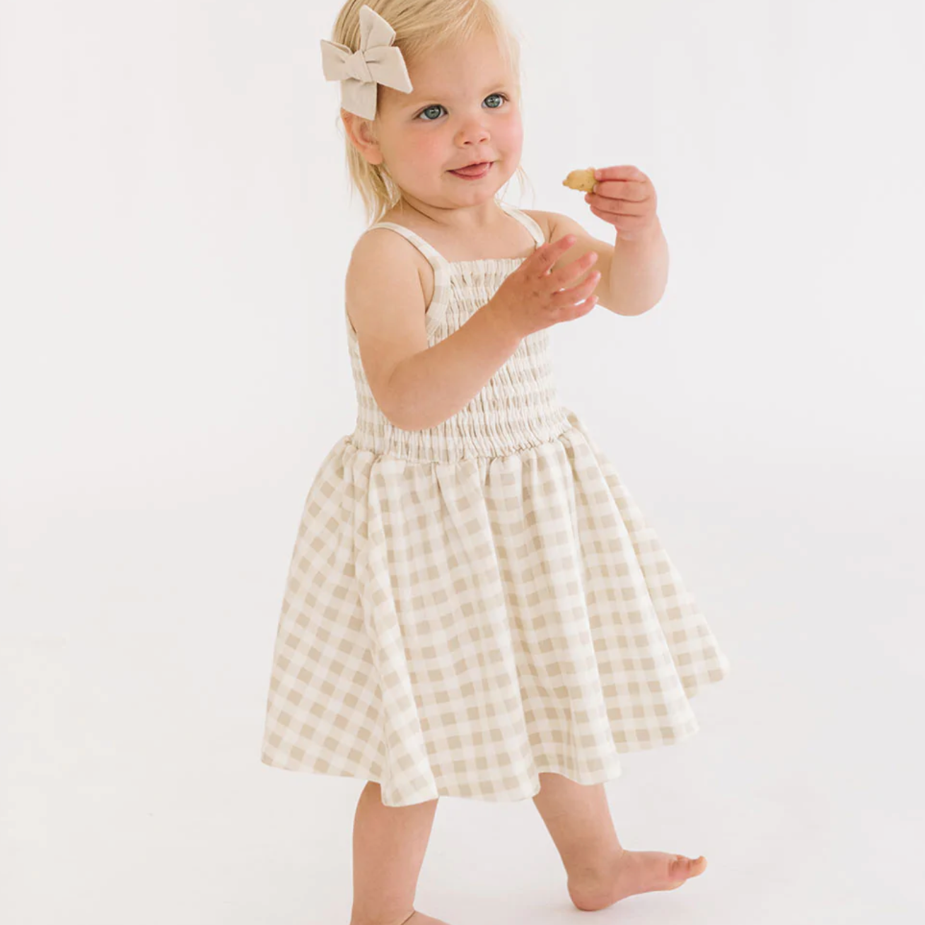 baby smocked dress in khaki gingham