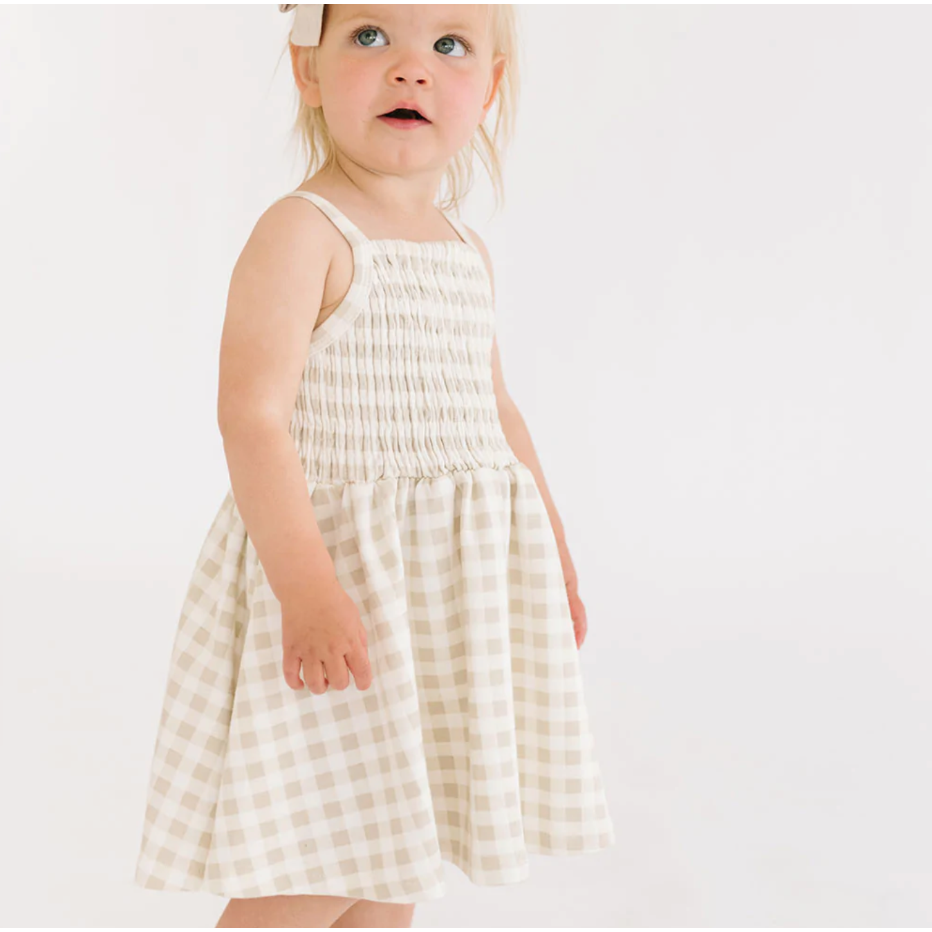 baby smocked dress in khaki gingham