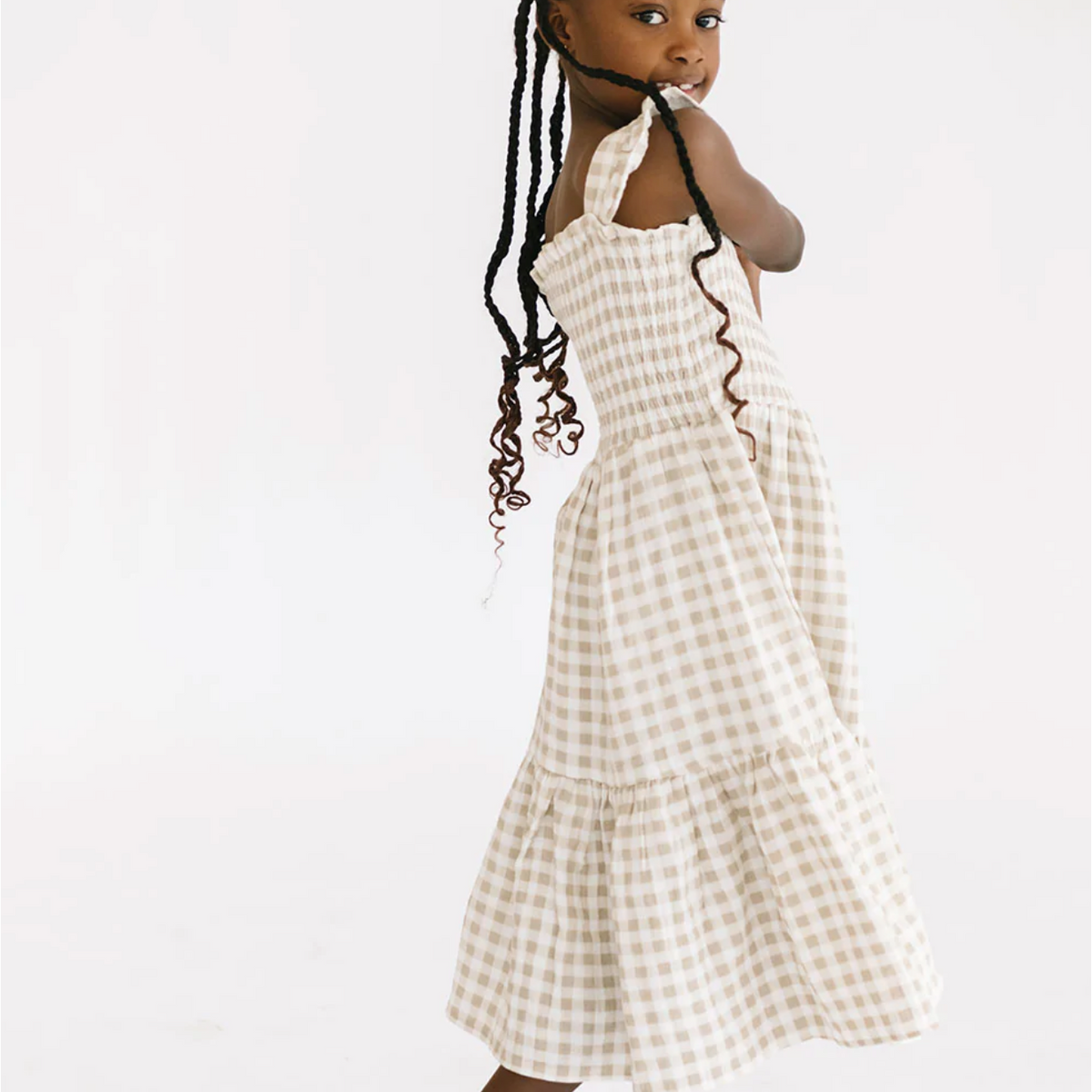 the smocked dress in khaki gingham