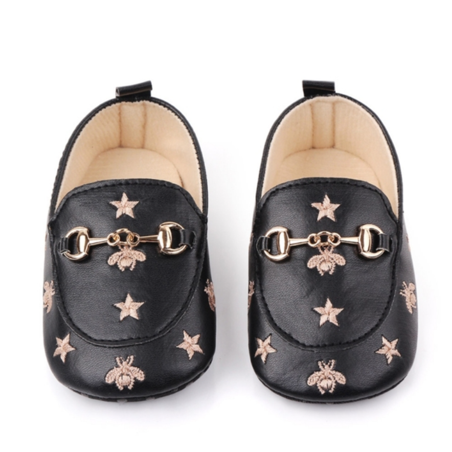 patterned baby mules in black