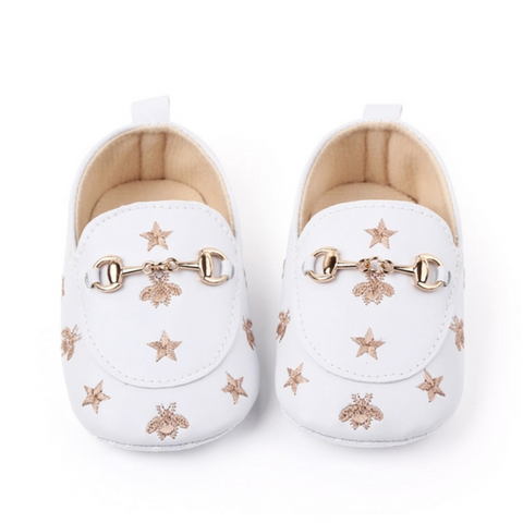 patterned baby mules in white