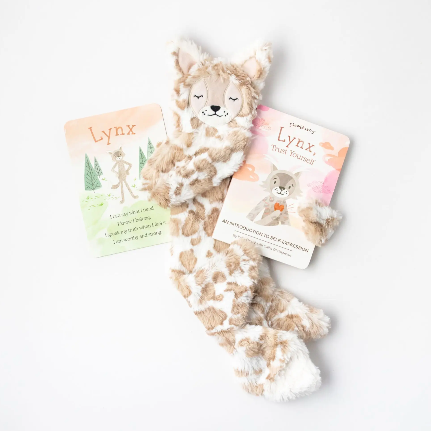 spotted beige lynx snuggler | self expression