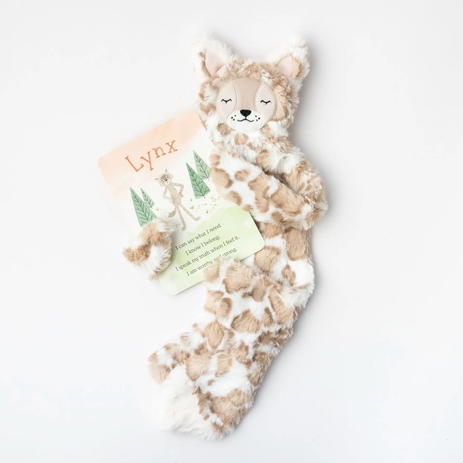 spotted beige lynx snuggler | self expression