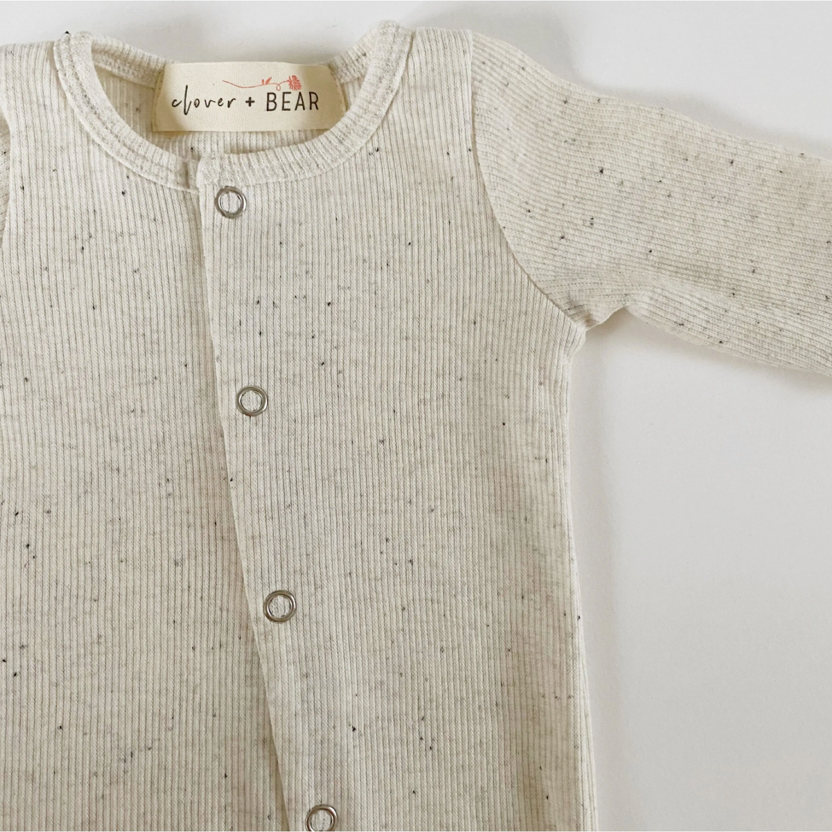 footed onesie | milk sprinkle